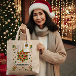 Load image into Gallery viewer, middle-agedfilipinowomanholdingtheMinaChristmasTotebag
