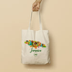 Load image into Gallery viewer, Kris Custom Jamaican Tote Bag featuring an illustrated map of Jamaica, filled with travel-related images of waterfalls, guital, steel drums, bongos, peace sign, ragae musical icons, river dunn, palm trees, ackee fruit, coconuts, cruise ship, red billed steamer-tail, lignum vitae flower, football and starfish 
